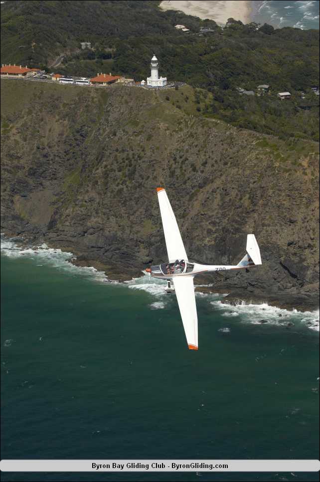 Dimona_Motor_Glider_Flying_over_Byron_Bay_Lighthouse.jpg
