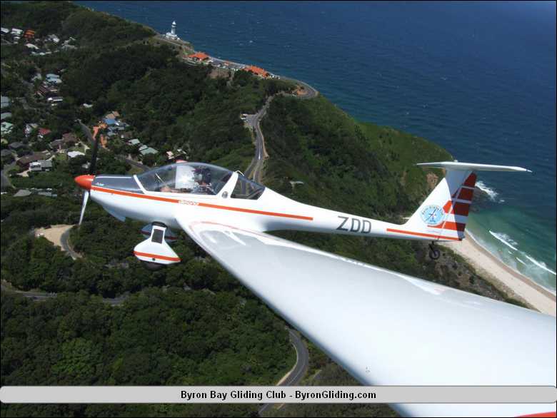 Dimona_Motor_Glider_over_Lighthouse_Byron_Bay.jpg