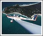 Dimona Motor Glider over Byron Bay Lighthouse.jpg