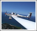 Dimona Motor Glider over Cape Byron Lighthouse.jpg