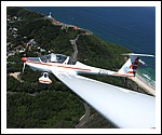 Dimona Motor Glider over Lighthouse Byron Bay.jpg
