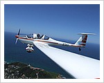Dimona_Motor_Glider_over_Cape_Byron_Lighthouse.jpg