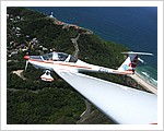 Dimona_Motor_Glider_over_Lighthouse_Byron_Bay.jpg