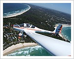 Dimona_Motor_Glider_over_Watego_Beach.jpg