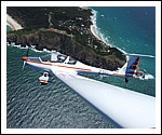 Glider over Byron Bay Lighthouse.jpg
