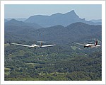 Two_Gliders_Flying_near_Mt_Warning,_NSW.jpg