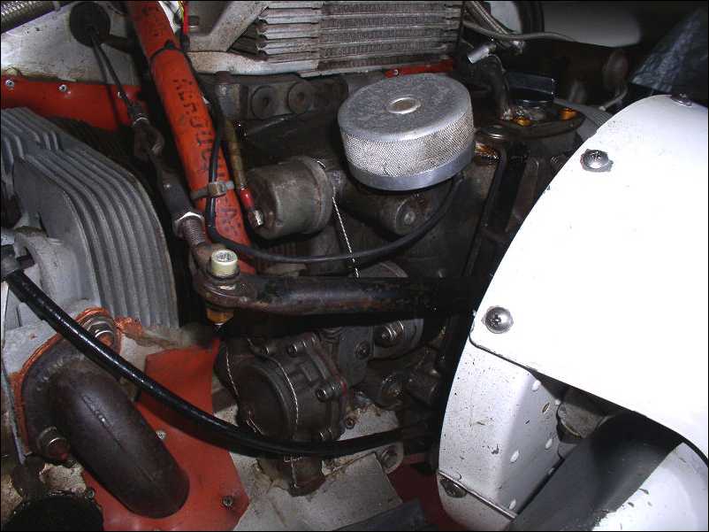 G109_Engine_front_RHS_-_CDI_pickup,_fuel_pump,_oil_pressure_sensor.jpg