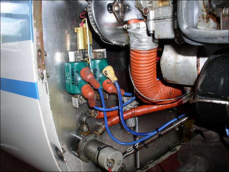 G109_Firewall_-_CDI_coils,_Hardi_fuel_pump,_air_cleaner.jpg