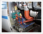 G109_Firewall_-_CDI_coils,_Hardi_fuel_pump,_air_cleaner.jpg